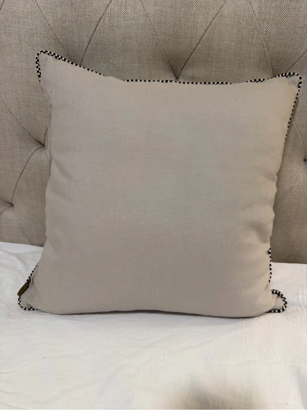 Mackenzie-Childs Brass Oval Logo Tag on Textured Fabric Pillow